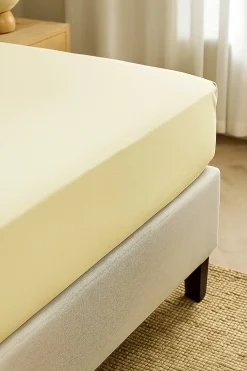 Prześcieradło z gumką z mikrofibry kremowe jasne żółte masełkowe 120x200